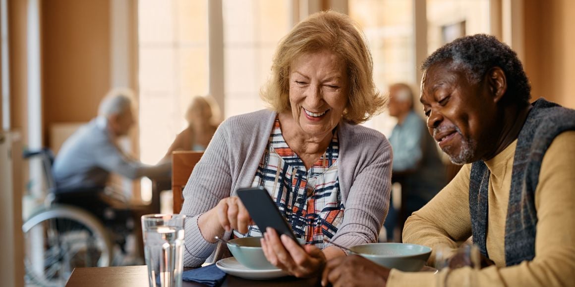 senior lady looking at phone