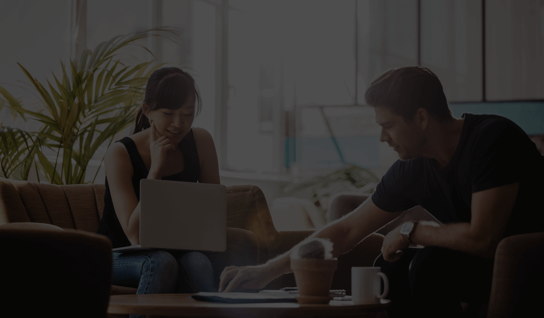 two people working together