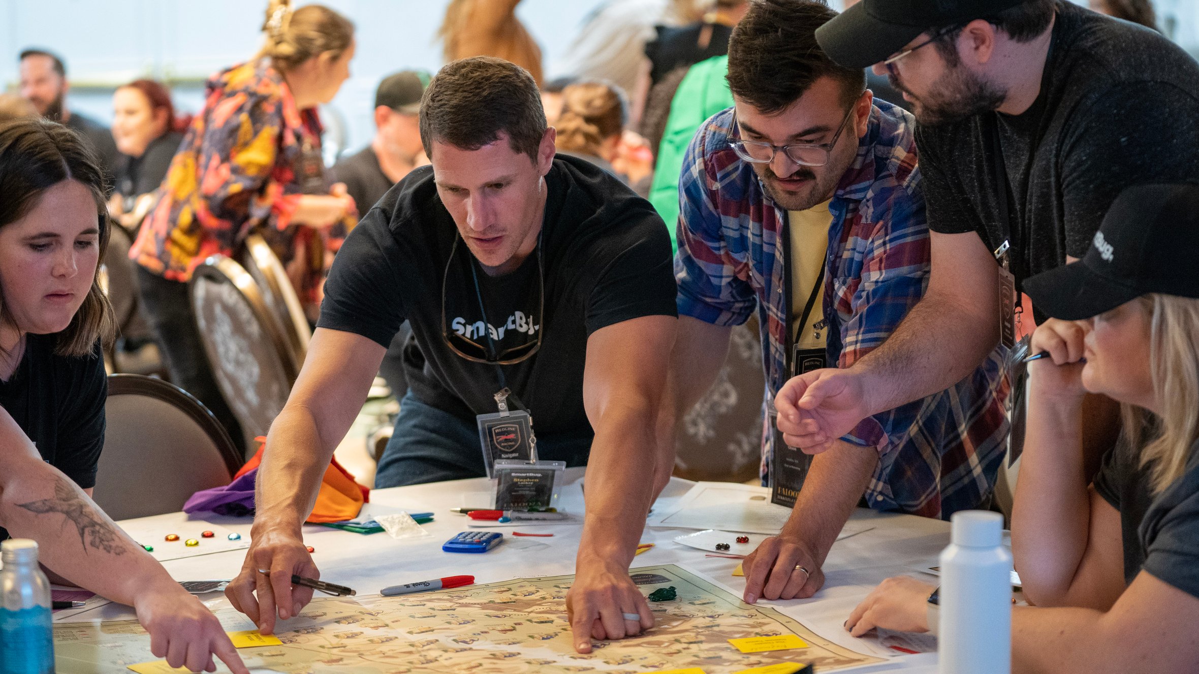 SmartBug Employees Strategizing on a table 