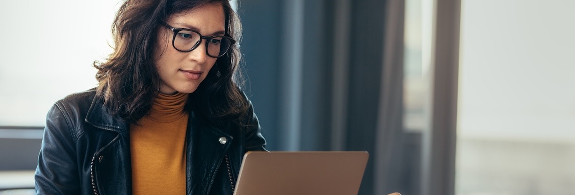 Asian woman working laptop at office