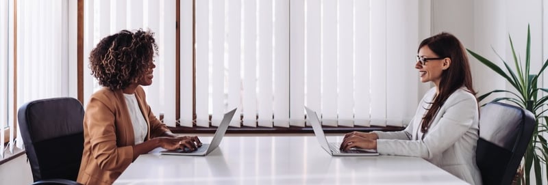 Two woman having business meeting