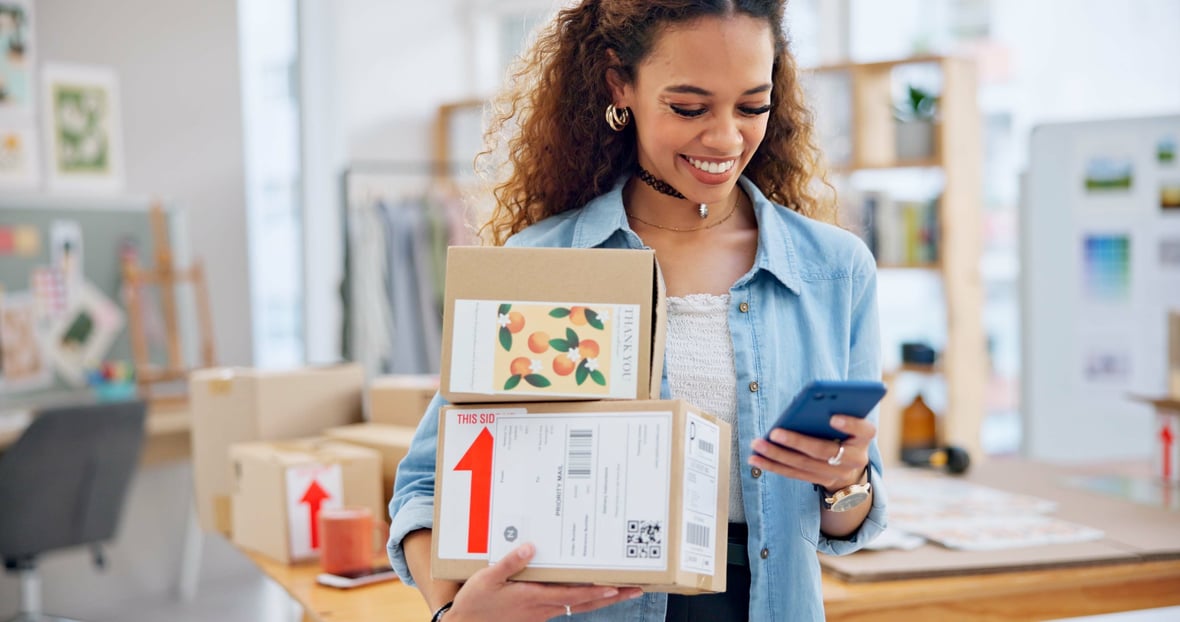 Woman checking e-commerce marketing emails on phone