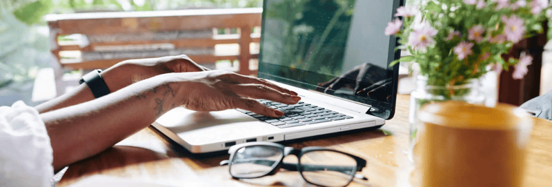 A woman downloads a copy of an eBook from a Thank You page. 