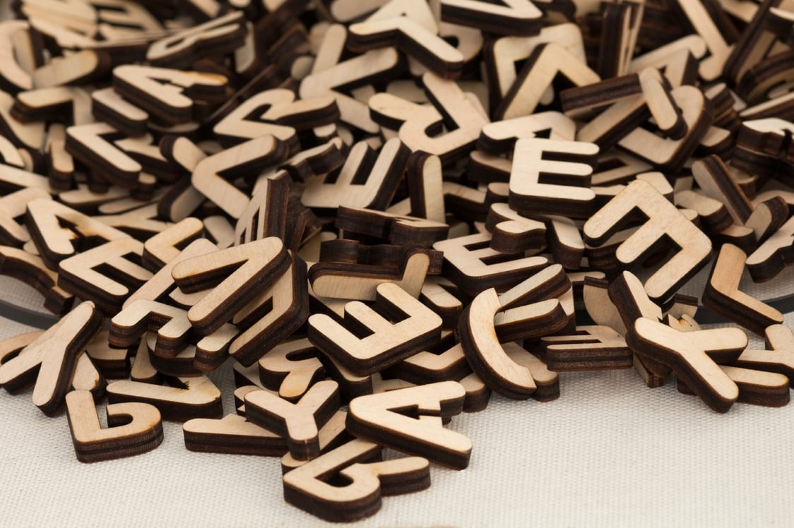 wooden letters in a pile