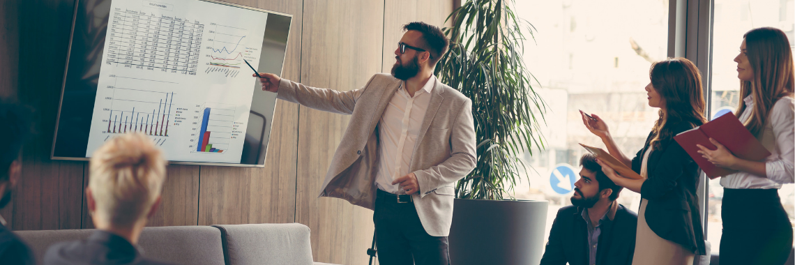 Individual presenting to a group of people