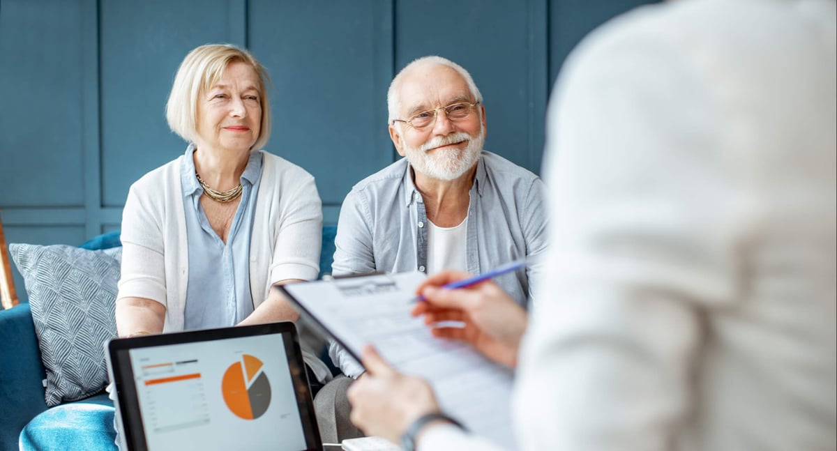 Senior couple talking to a specialist