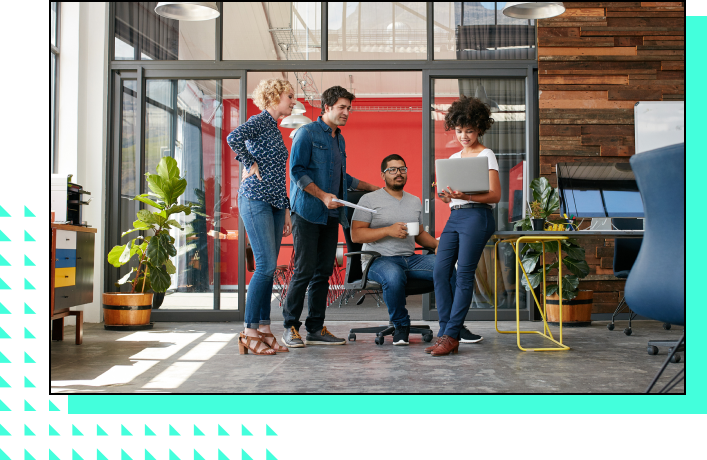 group of employees enjoying working in an office