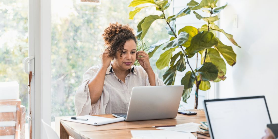 Woman getting ready to work on her laptop