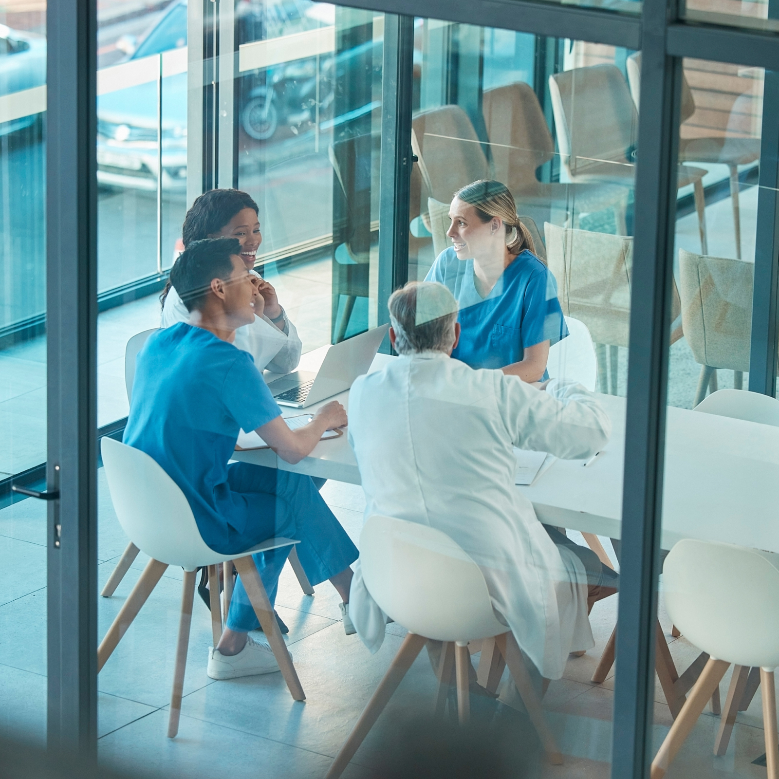A group of nurses and doctors in a meeting room