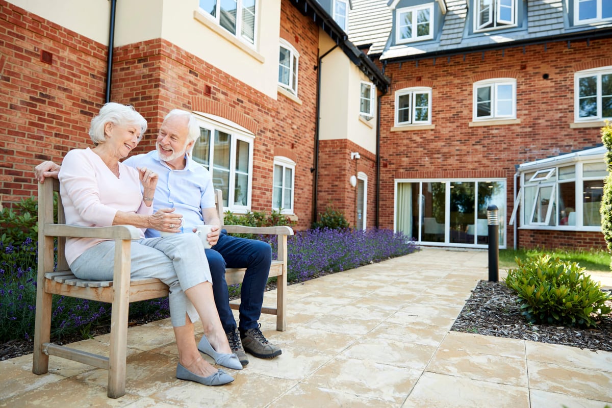 Senior couple outside on a bench