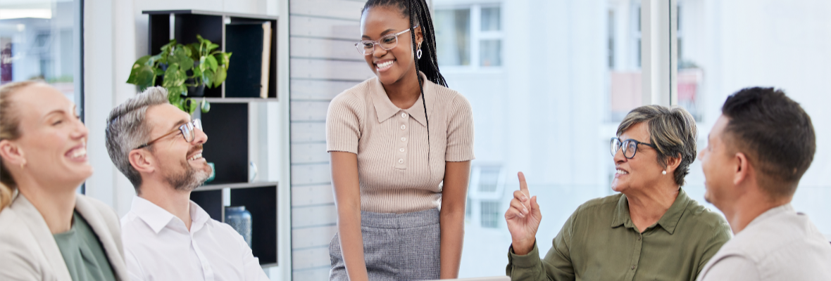 Woman in office explaining the benefits of channel marketing to her CMO