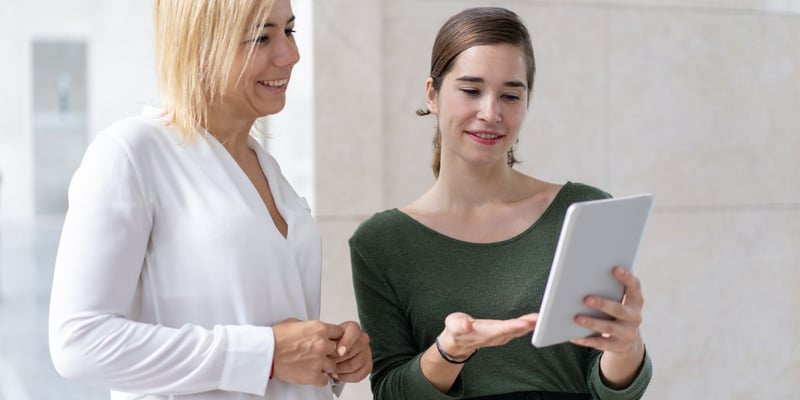 what are the most important parts of case study Two women looking at a tablet while smiling