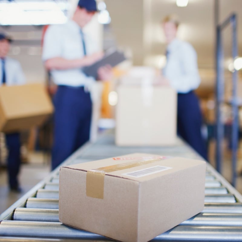 Boxes moving down an assembly line