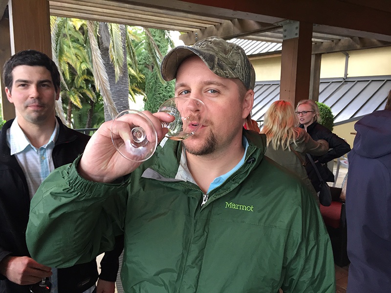 a SmartBug drinking wine