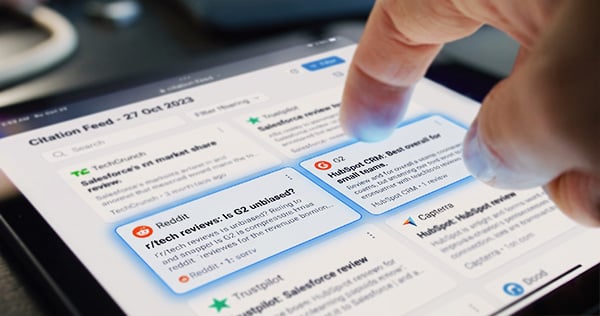 finger-scrolling-citation-feed-reviews-tablet
