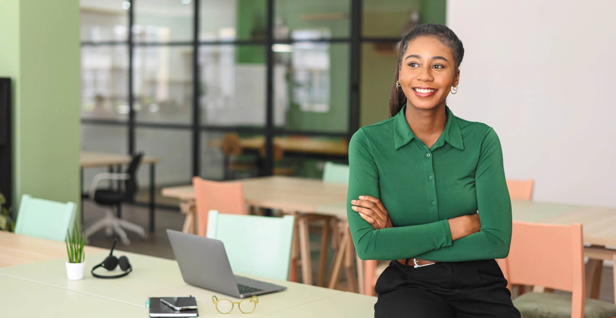 confident woman smiling in a modern office