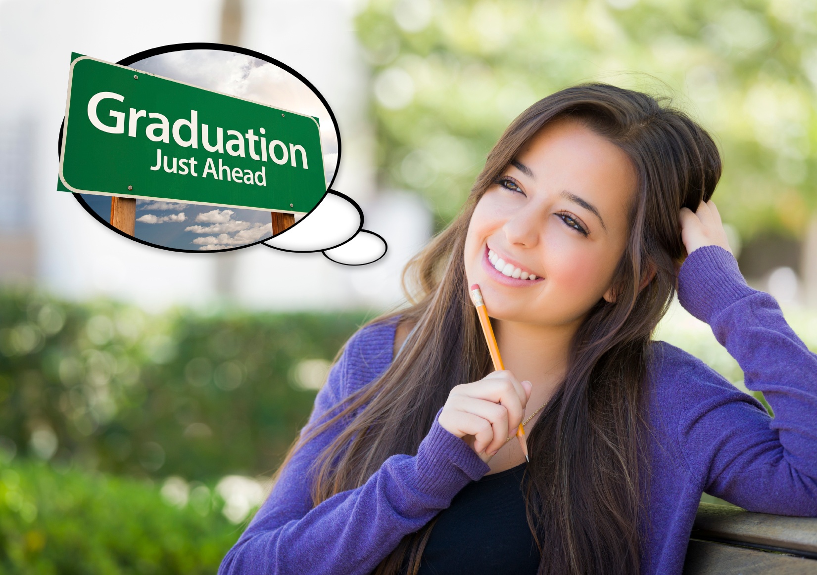 Photo of girl on park bench with thought bubble thinking about college