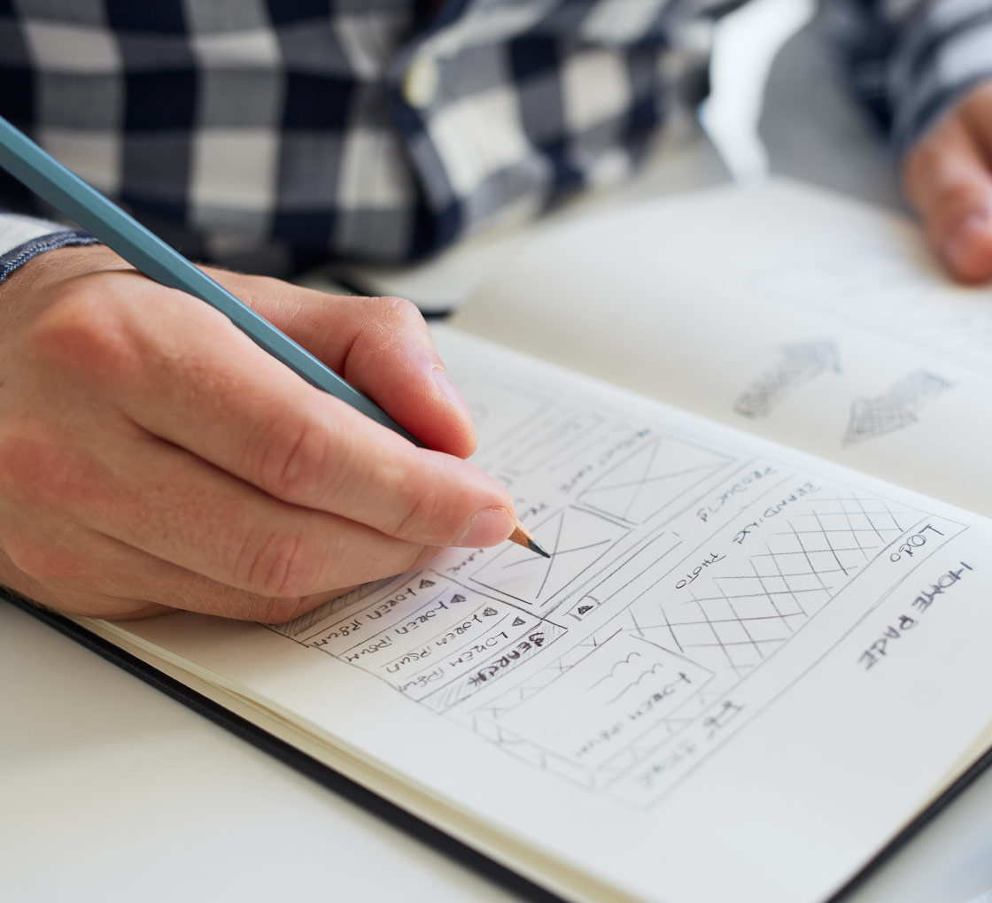 Man writing in notebook